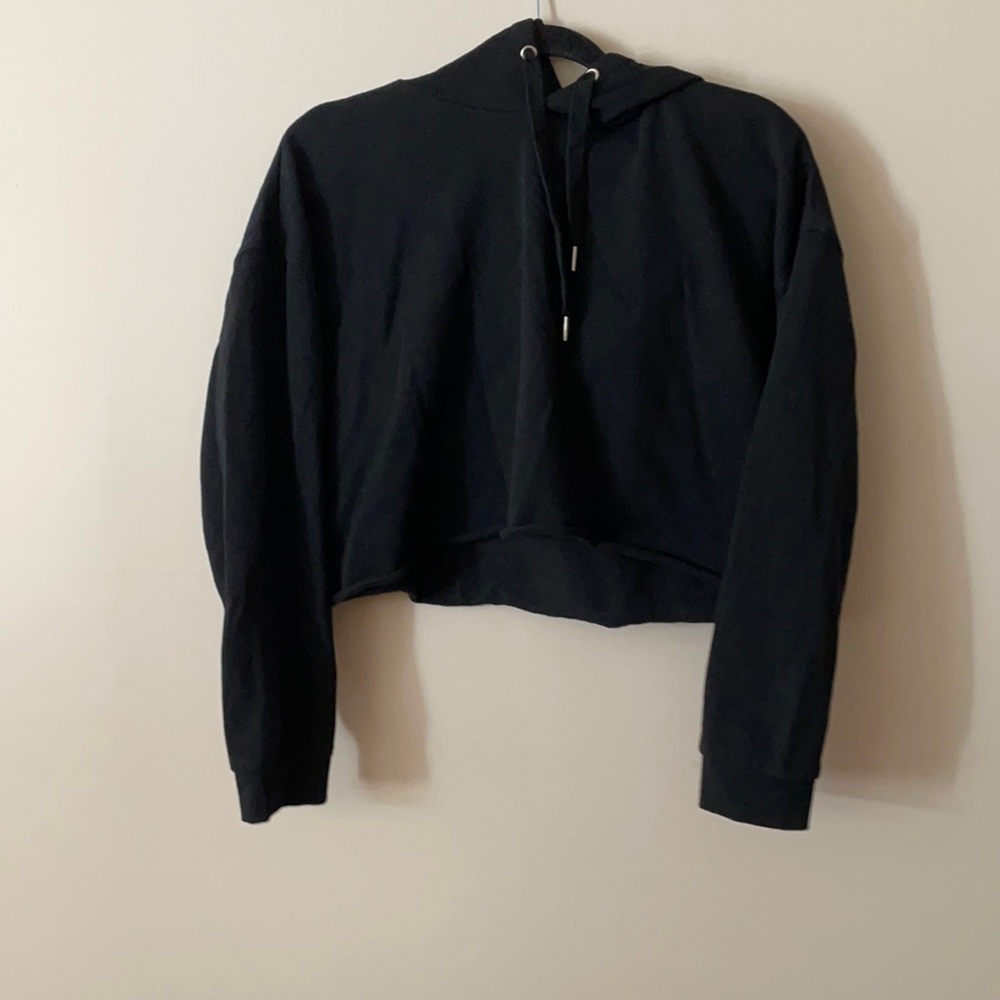 Black cropped hoodie.